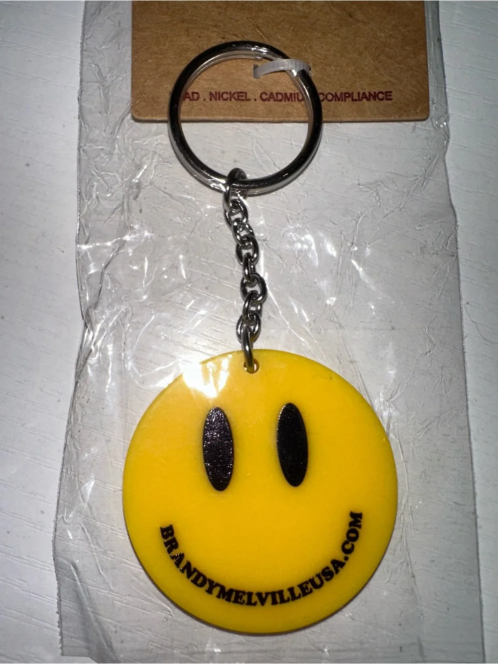 Brandy Melville Smiley Face Keychain